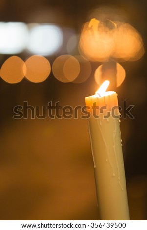 Candle light with light bokeh in the background