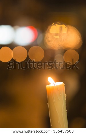 Candle light with light bokeh in the background