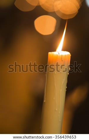 Candle light with light bokeh in the background