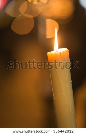 Candle light with light bokeh in the background