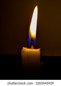 A Candle Is Lit To Light Up The Room At Night