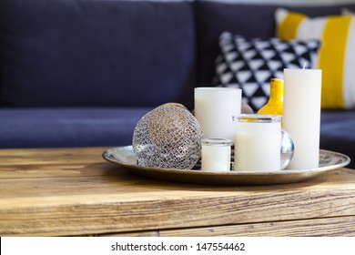 Candle Mix On Rustic Coffee Table