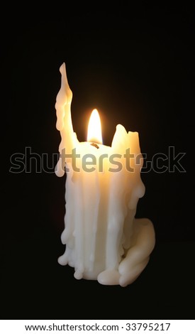 Candle on a dark background
