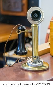 Candle Stick Phone Sitting On A Desk Top.  Vintage. Antique Phone.  Alexander Graham Bell.  