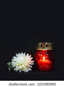 Candle And White Chrysanthemum On Dark Background With Copy Space. Sympathy Card