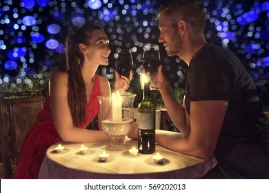 candlelight dining couple in love