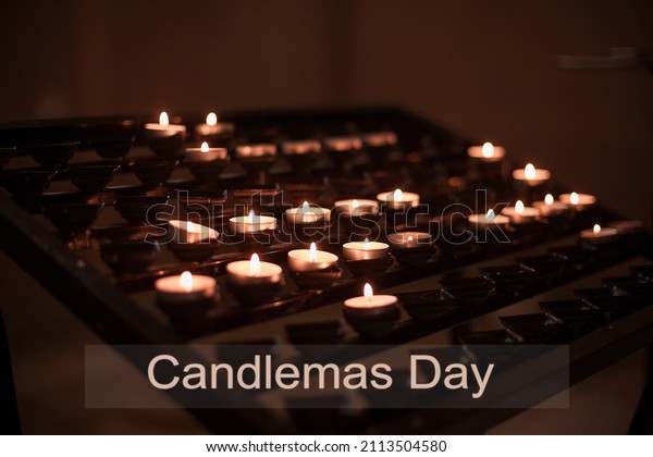 Candlemas day. Set\
of lighted candles in church. Hope, praying concept. It is\
celebrated on February 2, forty days after Christmas, in memory of\
the Meeting of the Lord in the\
temple.