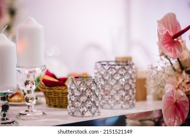 The Candles And Decor Of White Pink Flowers On Wedding Table. Close Up. Wedding Decor For Party.