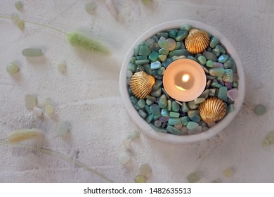 Candles Decorated With Gilded Shells And Green Pebbles. Sea Style.