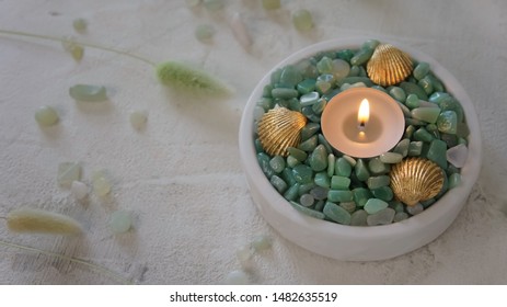 Candles Decorated With Gilded Shells And Green Pebbles. Sea Style.