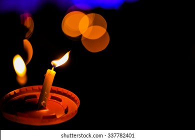 Candles Light Abstract Background In Night