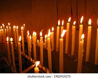 candles light flame in rows light in dark