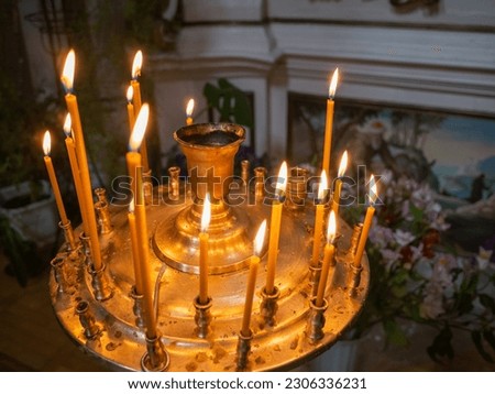 candles lighting in the orthodox church in lviv old city