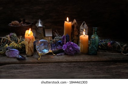 Candles, magic things and gemstones minerals on dark background. Healing stones for Crystal Ritual, wiccan Witchcraft. spiritual esoteric practice. life balance concept