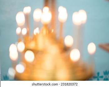 Candles and orthodox crucifix.