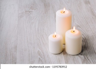 Candles for Spa with stones for a Spa - Shutterstock ID 1195783912
