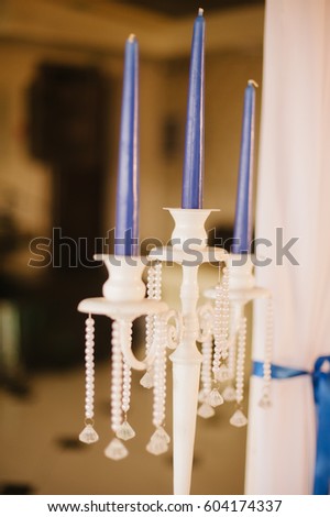 candlestick and candles in the room