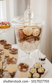 Candy Bar On Wedding. French Macaroons On A Cake Stand.