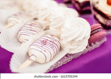 Candy Bar. Sweets. Food On Holiday. Sweet Table At The Wedding. Preparing For The Party. Wedding Banquet. Ice Cream, Cake, Macaroons, Muffins.