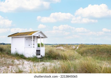 Candy Coloured Beach Hut In The Sand Dunes. Sweden, Skanör, 1 July 2022