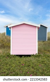 Candy Coloured Beach Huts In The Sand Dunes. Sweden, Skanör, 1 July 2022