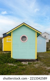 Candy Coloured Beach Huts In The Sand Dunes. Sweden, Skanör, 1 July 2022