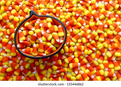 Candy Corn Candies In Orange Pumpkin Bowl