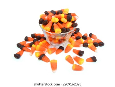 Candy Corn In Glass Bowl On White Background