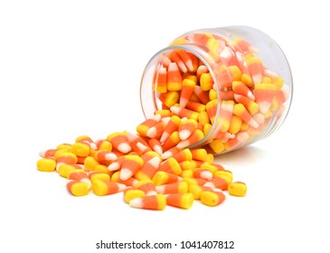 Candy Corn In Jar On White Background 