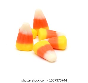 Candy Corn In Jar On White Background 