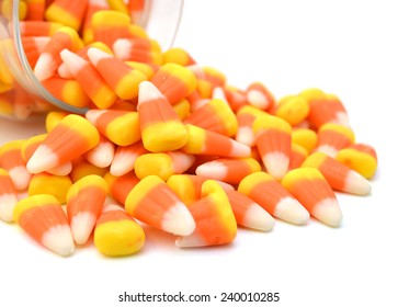 Candy Corn In Jar On White Background 