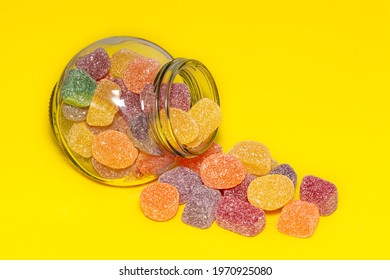 Candy Jar On Bright Yellow Background, Colorful Soft Jubes, Sugary Treats. Delicious Lollies, Healthy Eating.