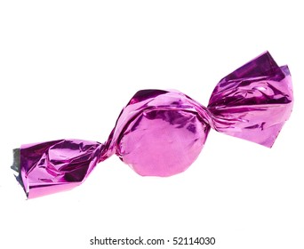 Candy In Lilac Wrapper Isolated On White Background