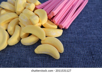 Candy lolly musk fruit sticks and yellow lolly bananas. Lollies