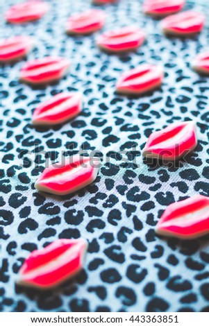 candy mouth lips on dark trendy background, minimal theme and design