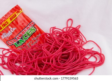 Candy Pile Of Delicious Red Strawberry Laces - Flavoured Licquorice By Sweet Co.  Thetford, Norfolk, UK - July 19th 2020