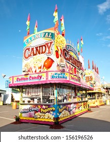 Candy And Popcorn Stand On A Carnival Midway