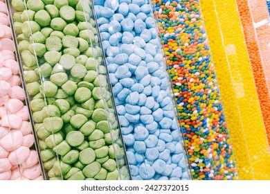 Candy store background. Candies container. Various types of sweets. Gummy bears collection. Kinds paradise background. Sugar snack. Group of jelly.