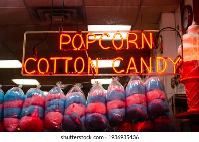 Candy Store Front Night Window Display Of Colorful Cotton Candy Sugary Treats 