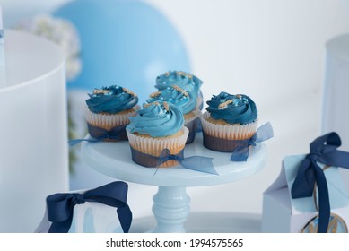 Candy Table With Muffins And Communion Floats