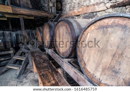 Cane Garden Bay Tortola BVI's Callwood Rum Distillery equipment. Rum sitting in barrels, stocked for tapping. 