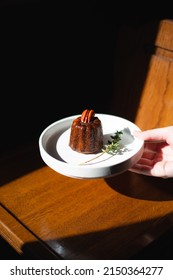 Canele On The Pastry Lattice For Glazing, French Traditional Dessert .