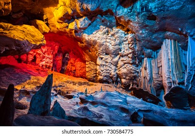 Cango Cave, amazing view on stalactites in colorful bright light, beautiful natural attraction, wonderful nature, touristic place, historical landmark, South Africa
 - Powered by Shutterstock