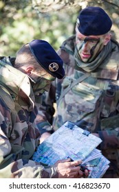 Canjuers, FRANCE - March 13 2012.Noncommissioned Officers Discuss The Plan Of Training Maneuvers.