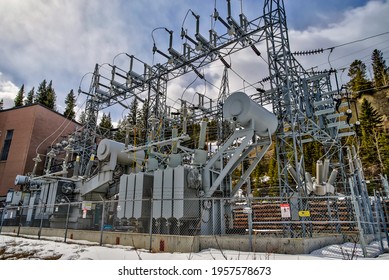 Canmore, Alberta - March 27, 2021: Hydro Electric Station Beside A Damn In Canmore Alberta