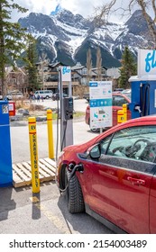 Canmore, Alberta - May 8, 2022: A Chevy Volt At An ATCO Fast Charding Station In Canmore, Alberta.