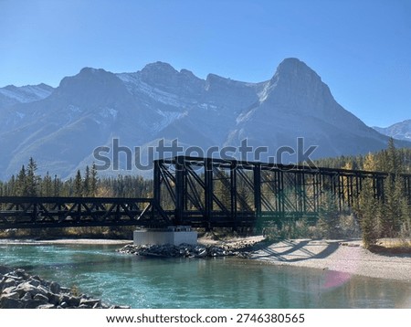 The Canmore Engine Bridge, a former rail bridge that has been repurposed into a pedestrian crossing over the Bow River in Canmore, Alberta, Canada.