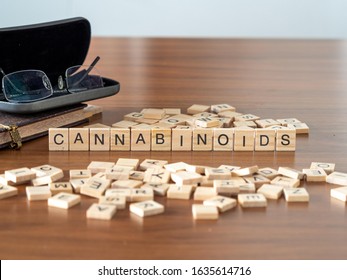 cannabinoids concept represented by wooden letter tiles