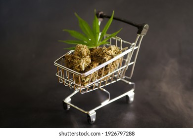 Cannabis Buds In Shopping Cart. Marijuana Leaf Delivery 