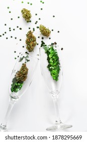 Cannabis In Champagne Flutes Cheers For Celebration. Cannabis Confetti Concept For New Years, Birthday, Party, Anniversary And Wedding.